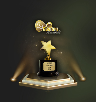 A gold trophy shaped like a star, placed on a pedestal with the word 'WINNER' inscribed on it, illuminated by spotlights displayed above against a green background.